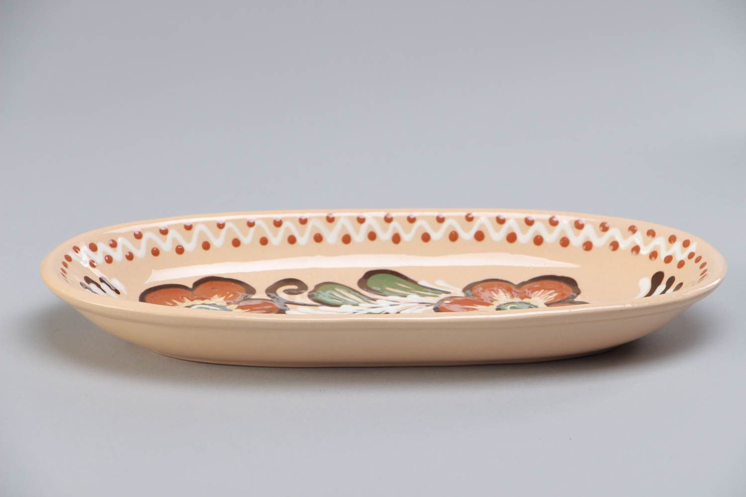 Handmade long ceramic dish painted and glazed with floral ornament for fish photo 2