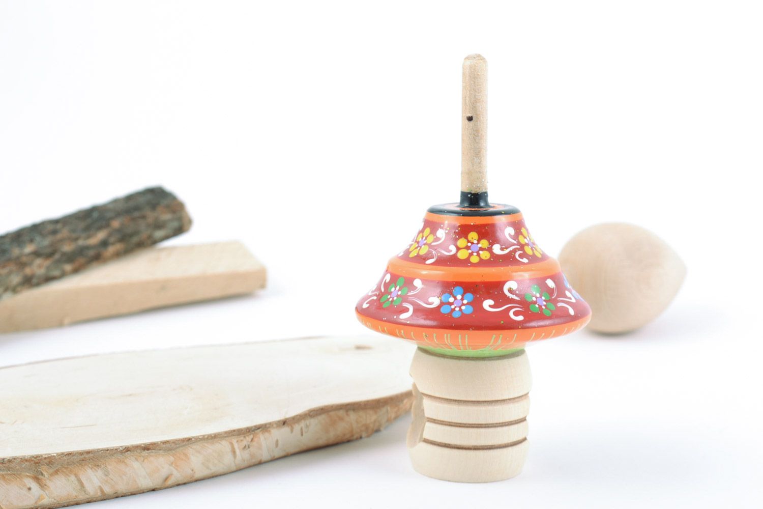 Beautiful handmade designer small wooden children's spin top toy with bright painting photo 1