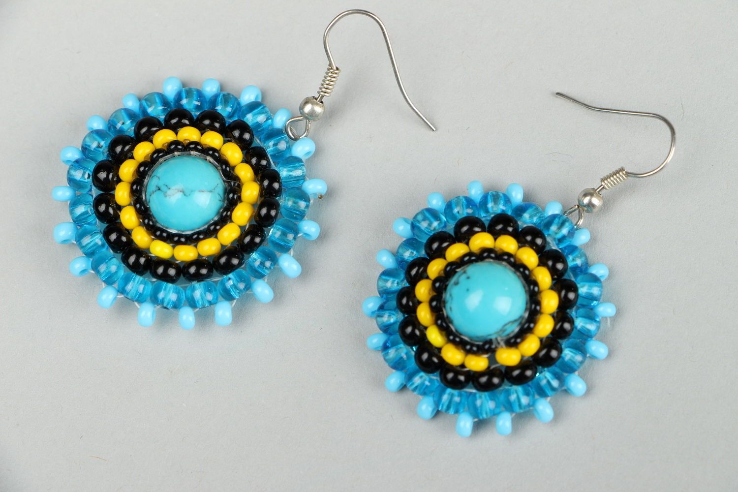 Earrings made of beads and turquoise photo 2