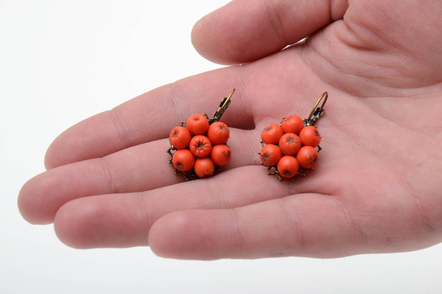 Handmade designer dangling earrings with cold porcelain berries of orange color photo 2