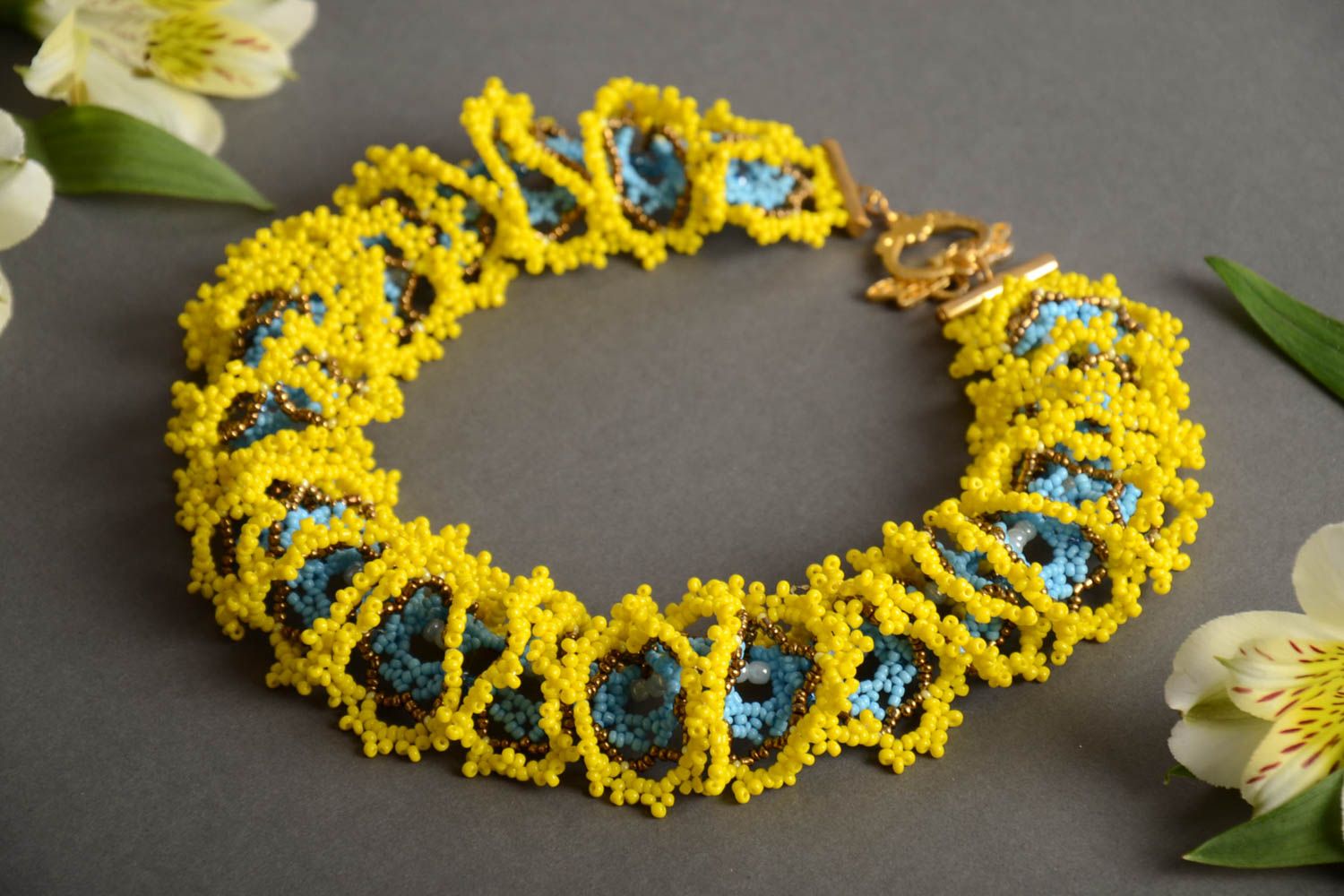 Handmade designer women's necklace woven of bright yellow and blue Czech beads photo 1