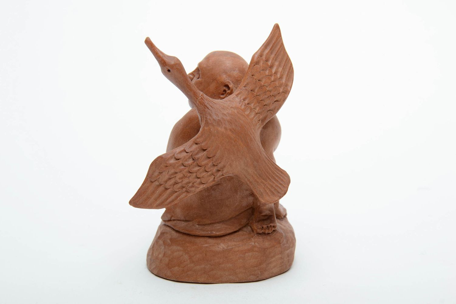 Small wooden figurine Bird in Hand photo 3
