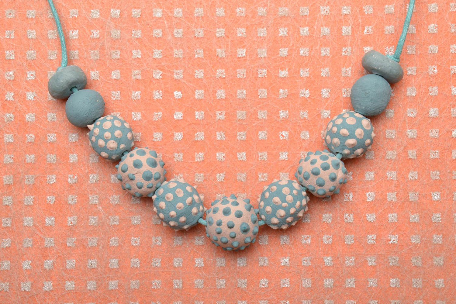 Ceramic bead necklace on waxed cord photo 1