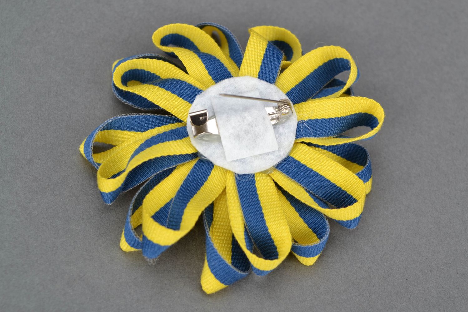 Textile brooch with rep ribbons photo 4