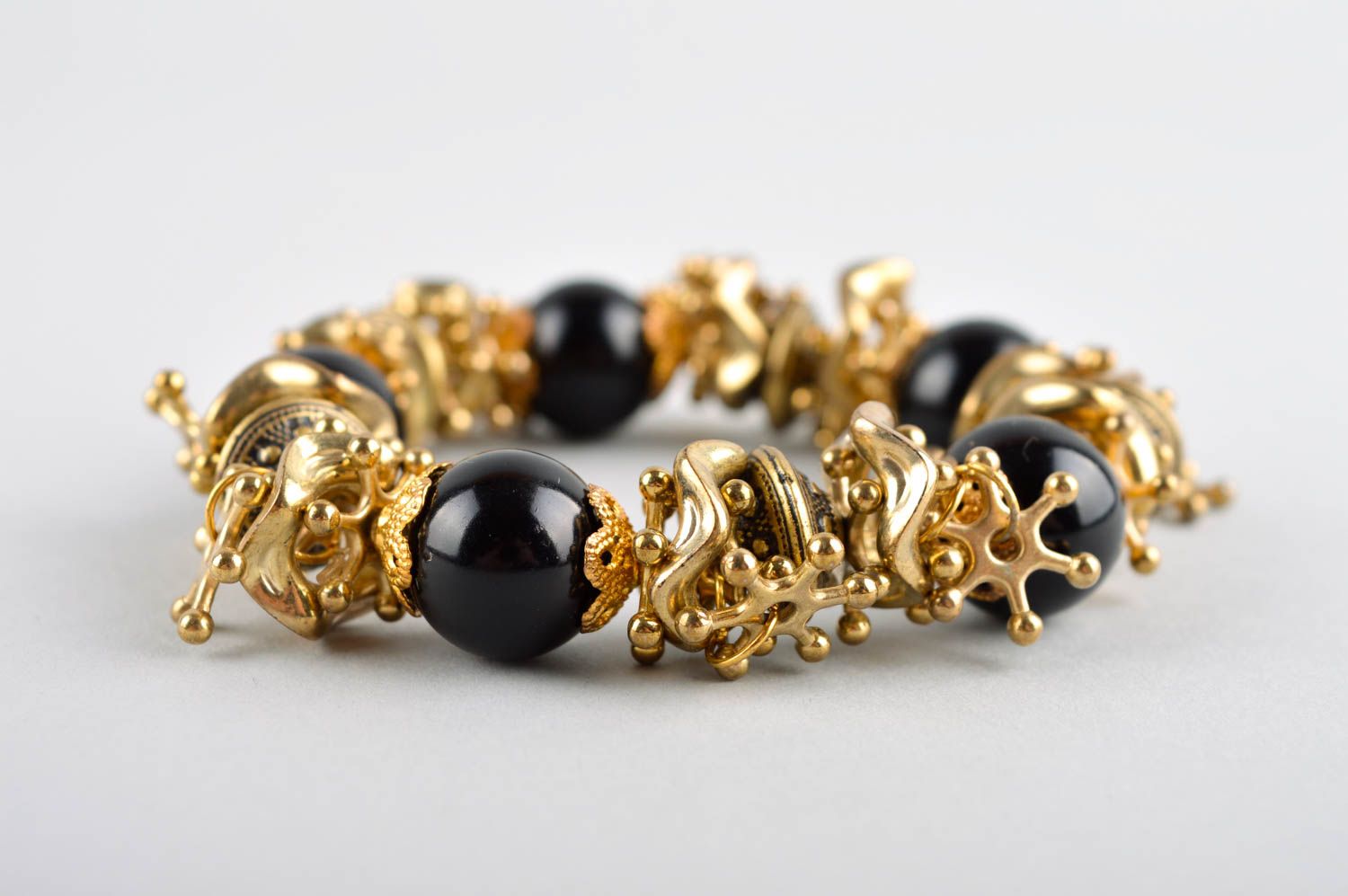 Elastic stretchy bracelet with black beads and golden color charms for teen girl photo 3
