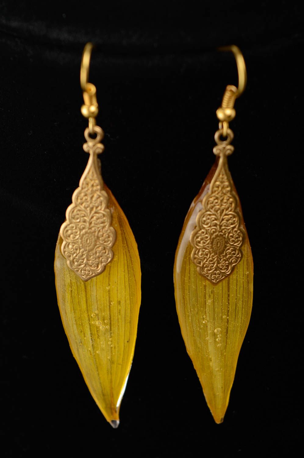Epoxy long earrings with natural sunflower petals photo 2