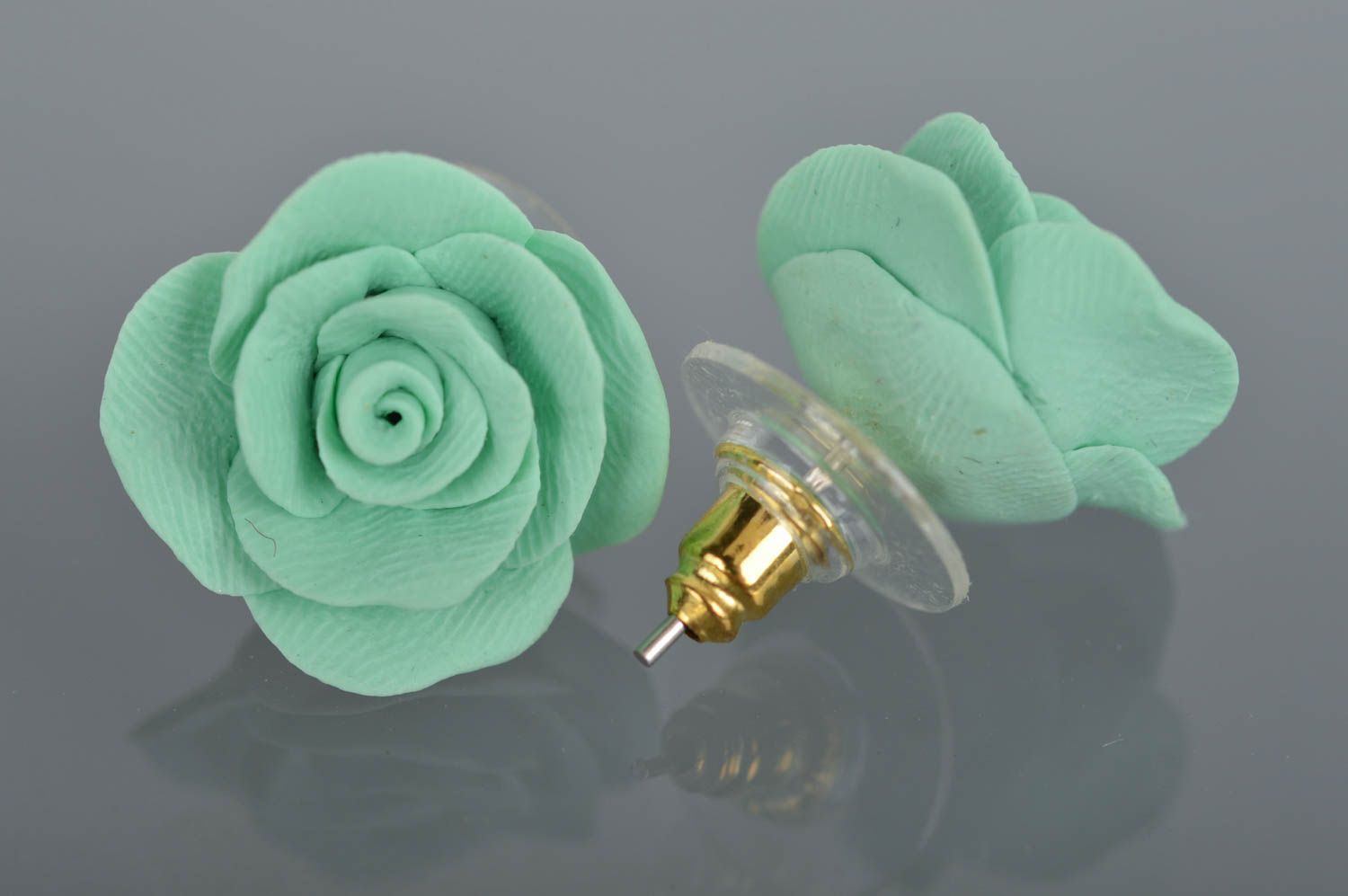 Beautiful handmade molded polymer clay flower stud earrings of mint color photo 4