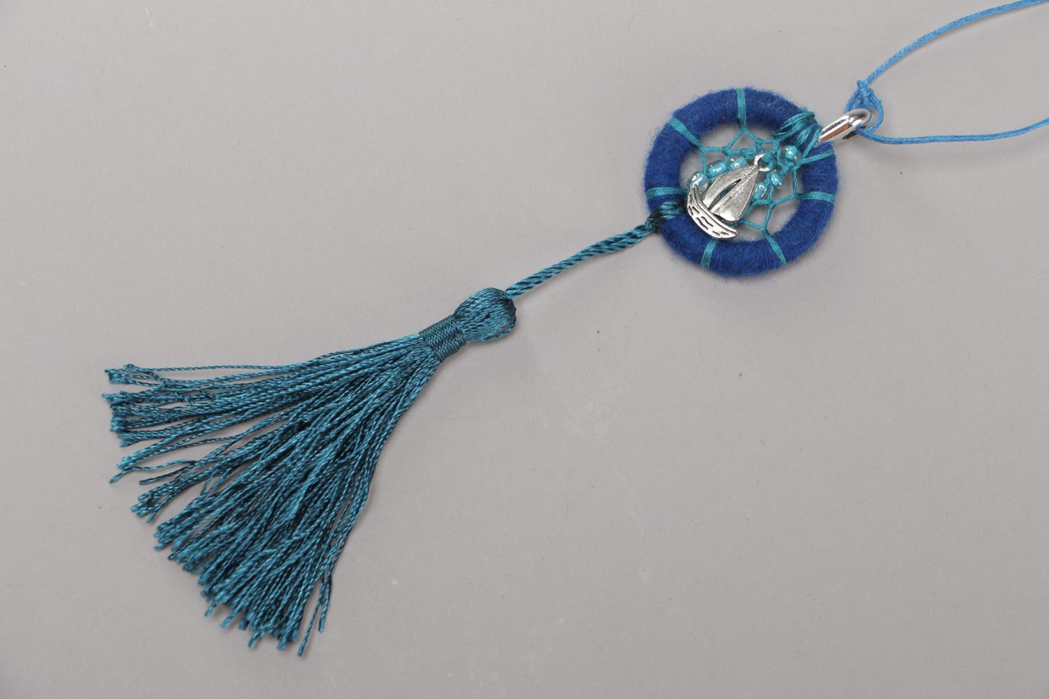 Handmade Native American dreamcatcher pendant necklace in blue color with tassel photo 2
