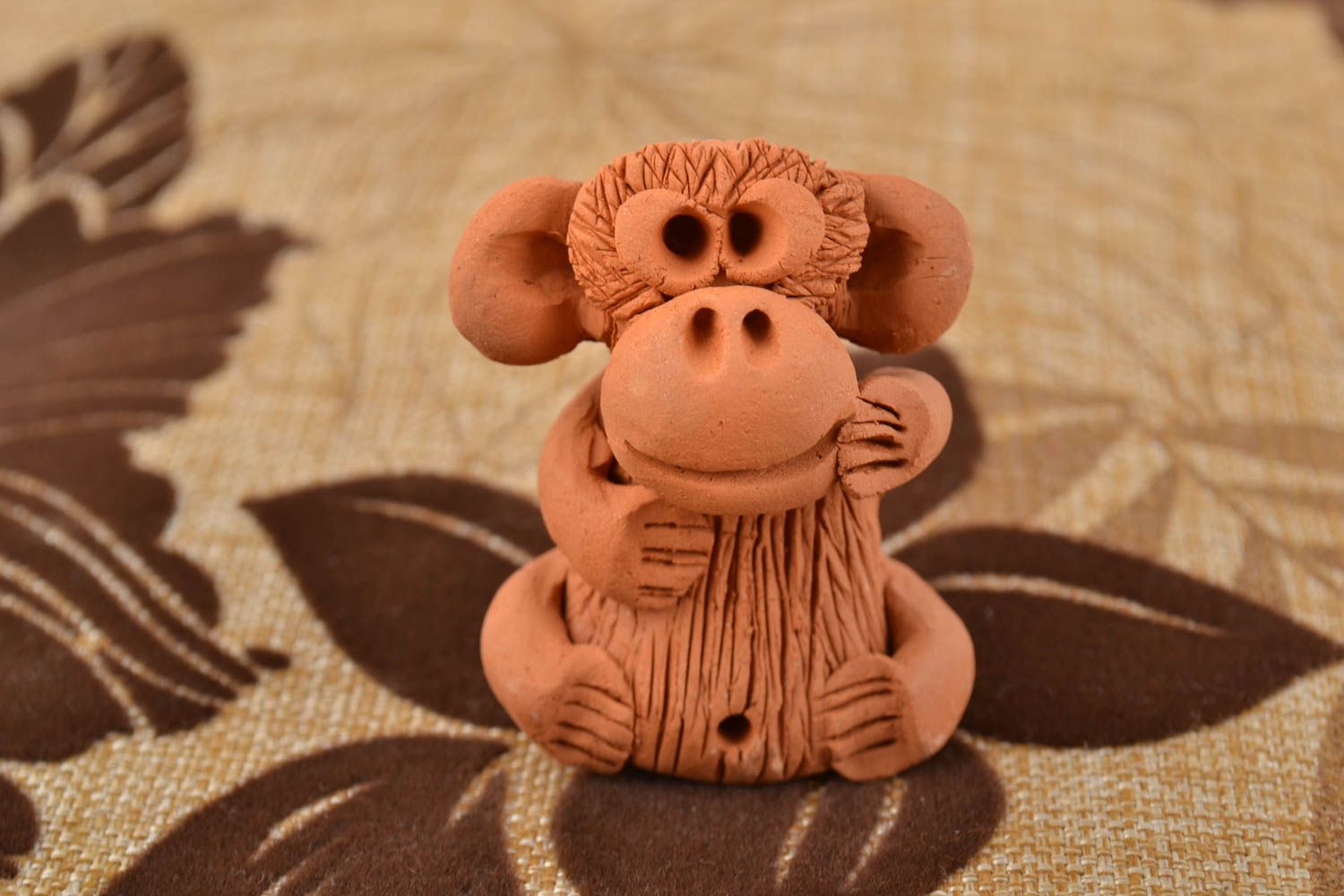 Unusual handmade miniature statuette molded of red clay Monkey photo 1