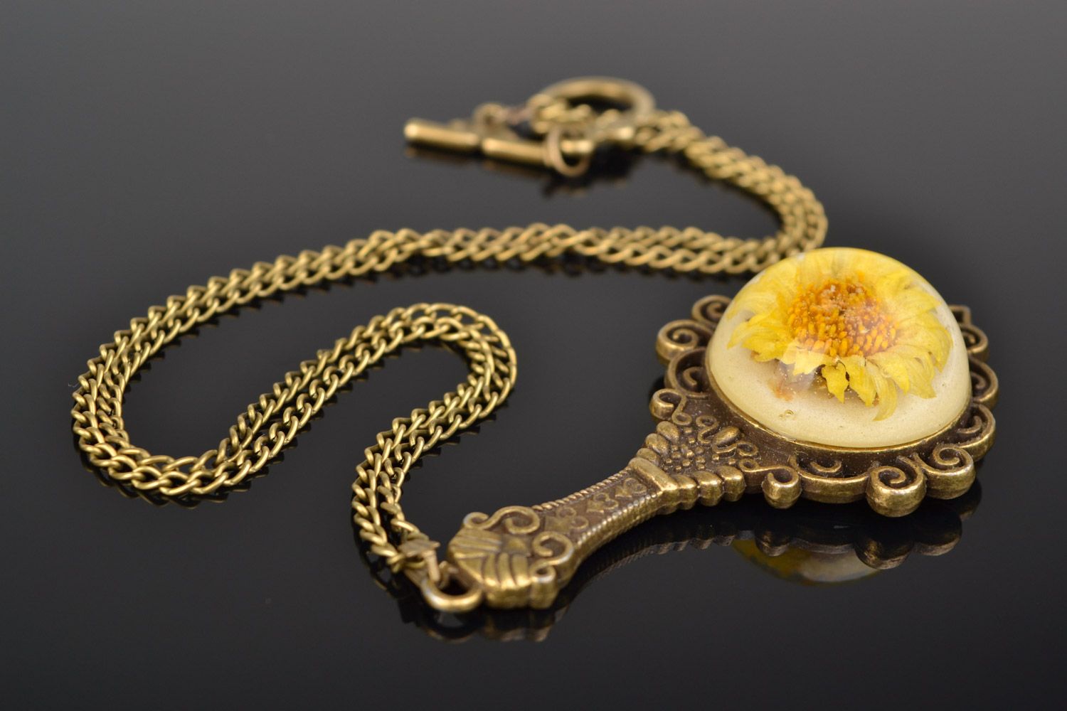 Handmade vintage pendant with chrysanthemum flower is epoxy resin on chain  photo 1