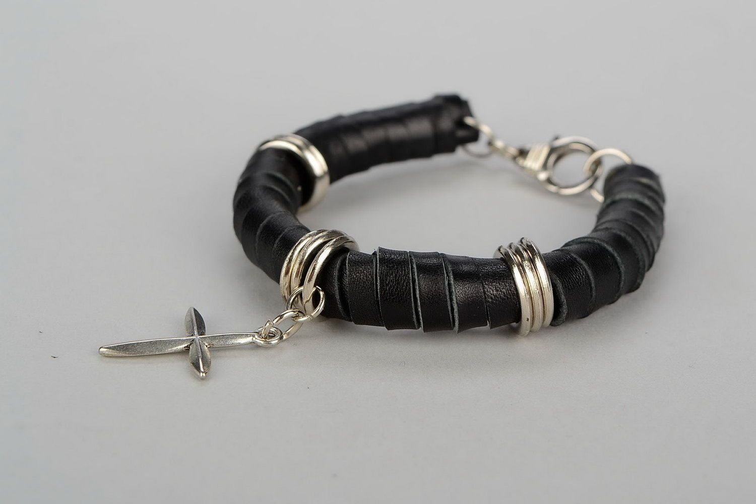 Leather bracelet with a cross photo 4