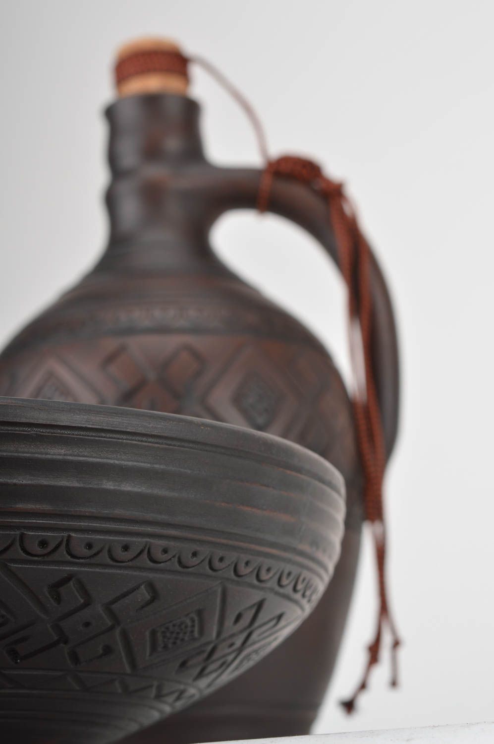 Set of handmade pottery kitchenware dark ceramic bottle with cork and fruit bowl photo 4