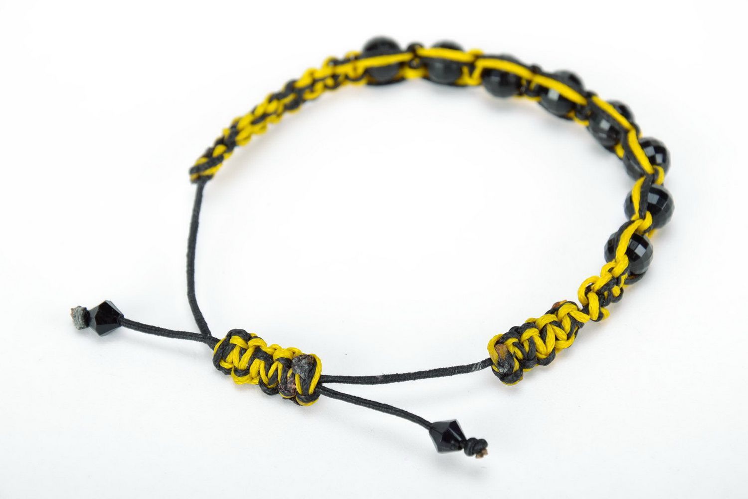 Yellow and black bracelet photo 2