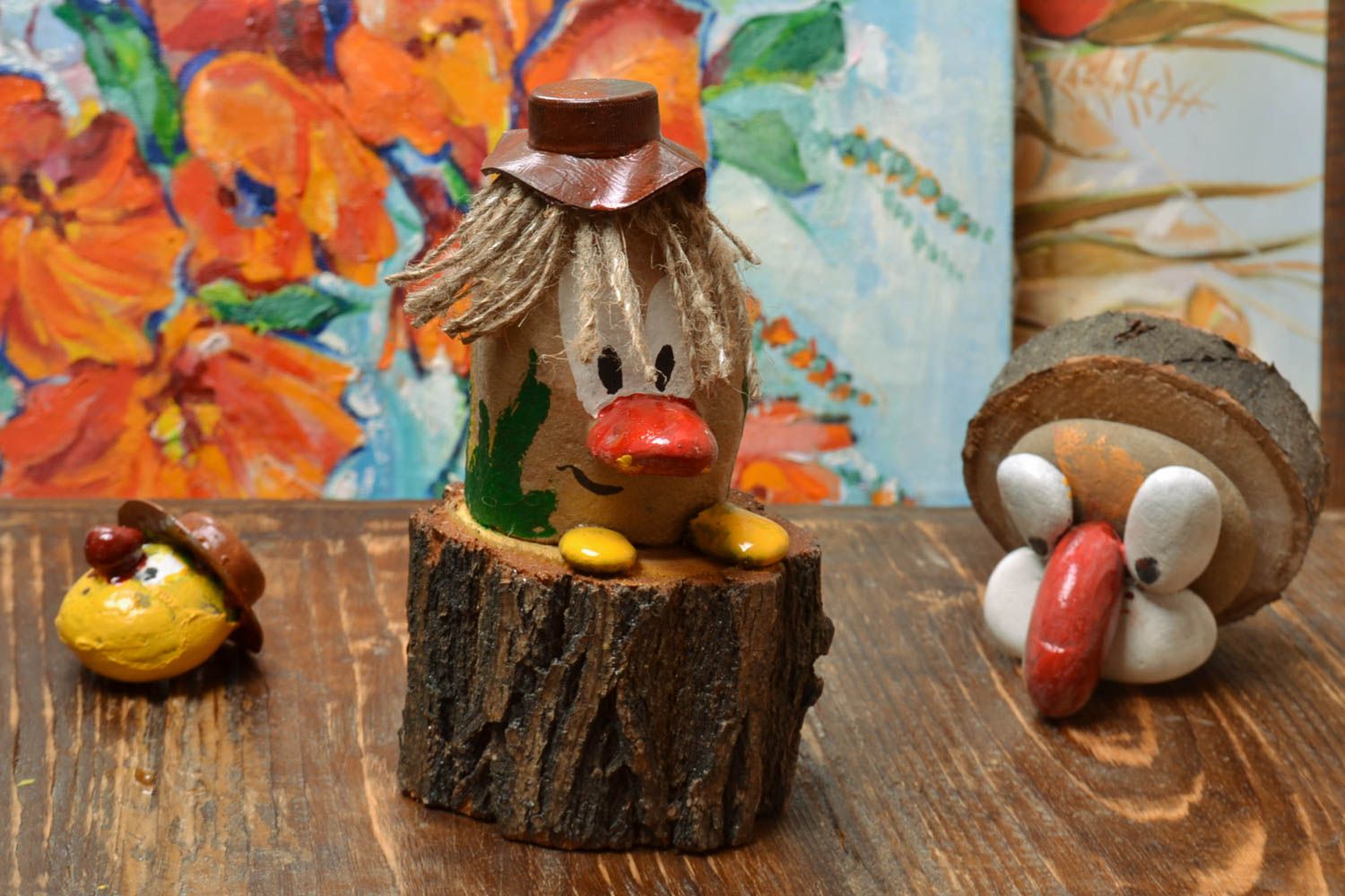 Handmade small painted funny wooden and stone figurine of leshy for children  photo 1