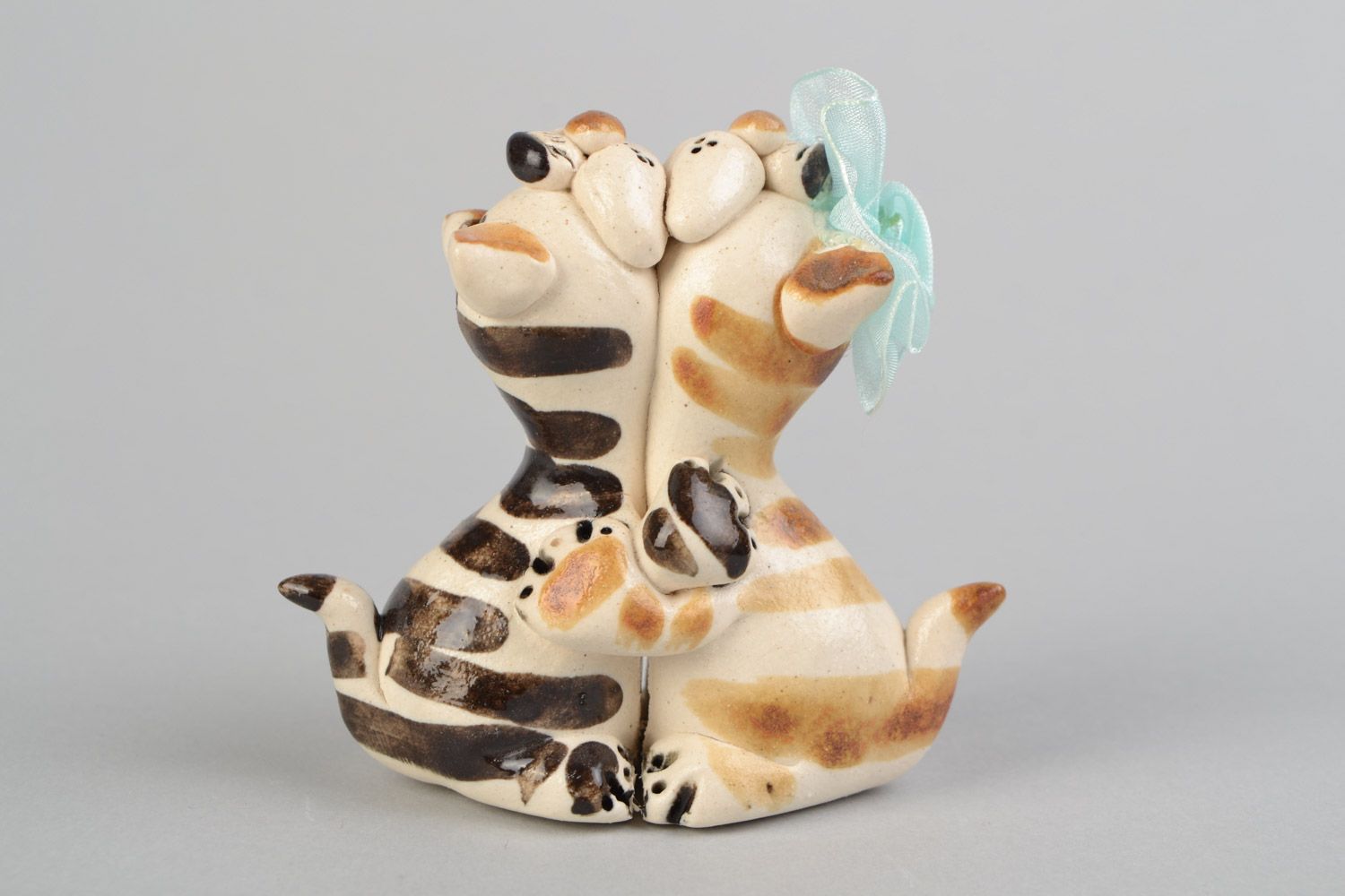 Handmade decorative ceramic figurine of two hugging cats painted with glaze photo 1