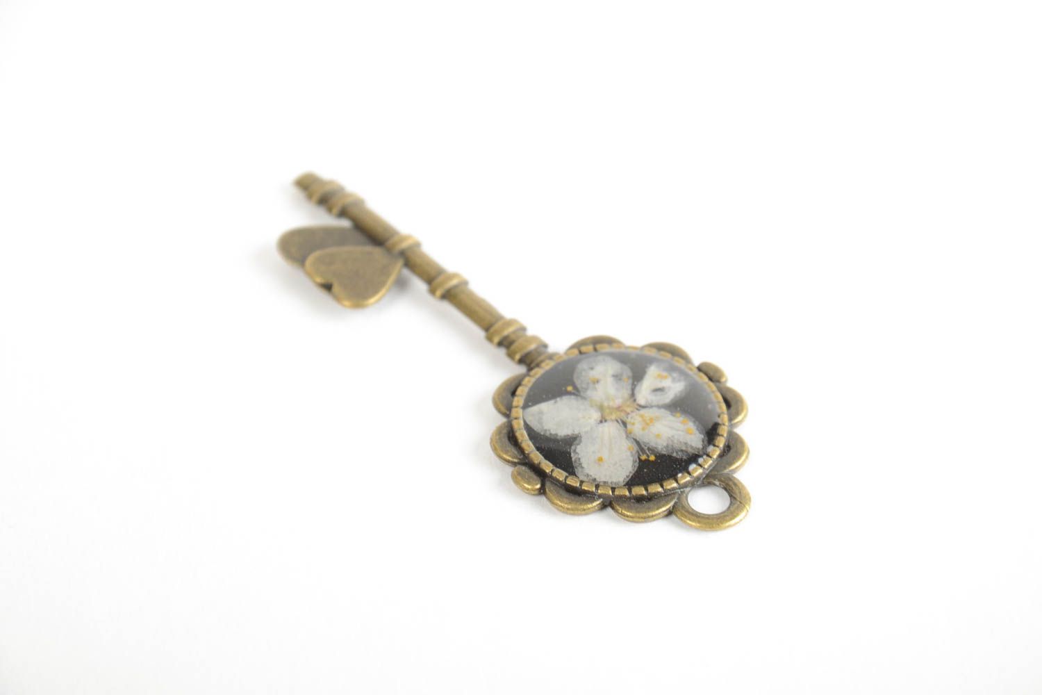 Handmade designer botanical pendant on metal basis coated with epoxy Key photo 3