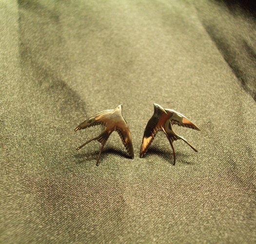 Metal earrings in the shape of birds photo 4