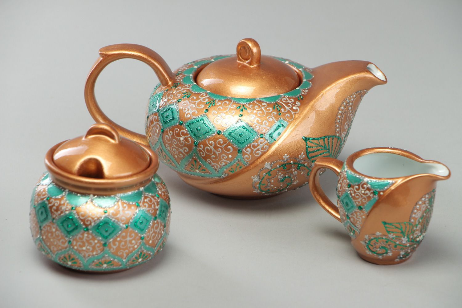 Tea set with teapot sugar jar and creamer jug in golden and green color 1,8 lb photo 1