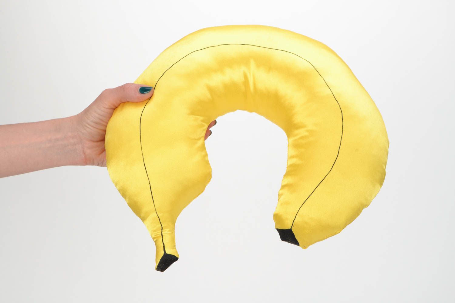 Handmade yellow satin travel pillow in the shape of banana photo 2