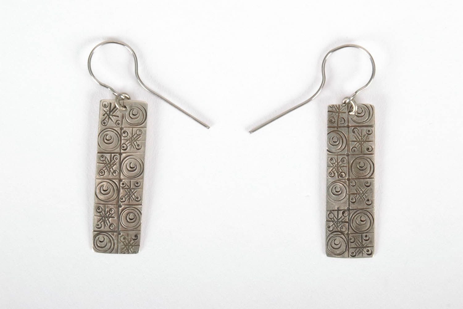 Stamped earrings made of melchior photo 2