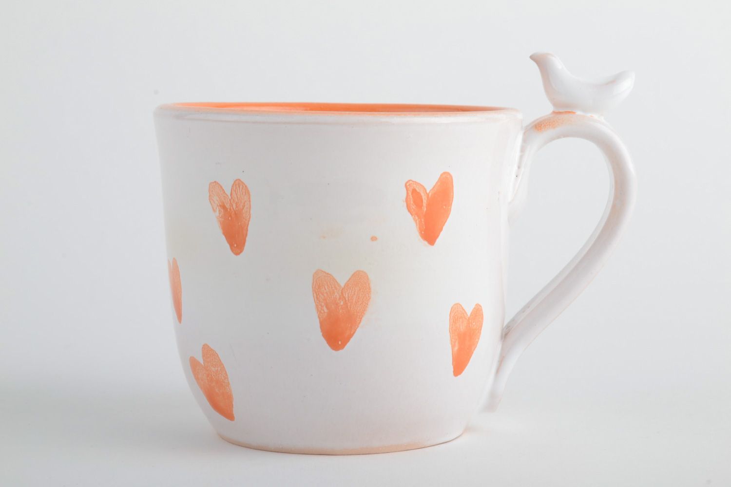 White and orange colors heart pattern ceramic cup for tea with handle photo 2