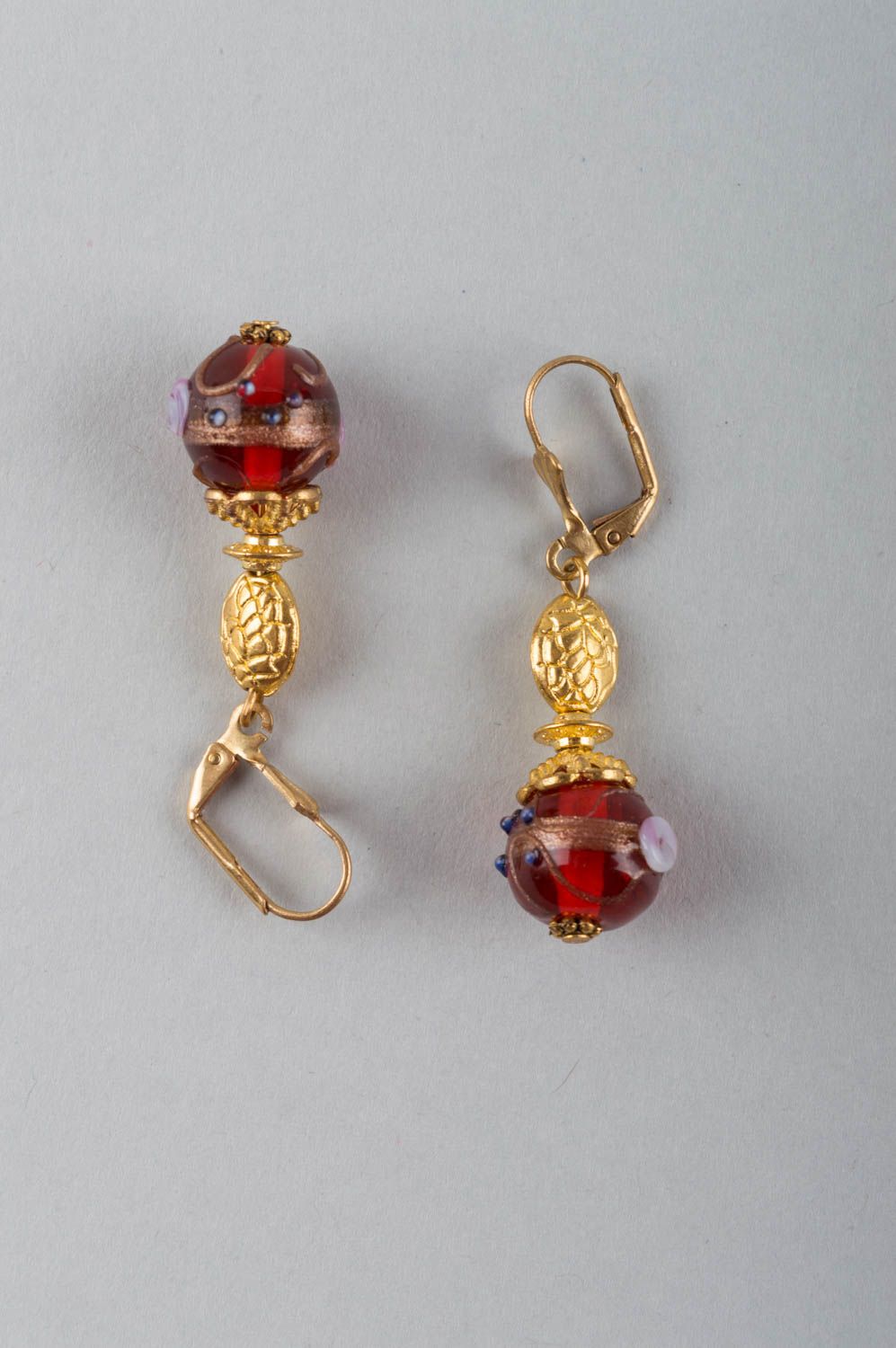 Handmade luxurious dangling earrings with golden colored basis and mural glass photo 2