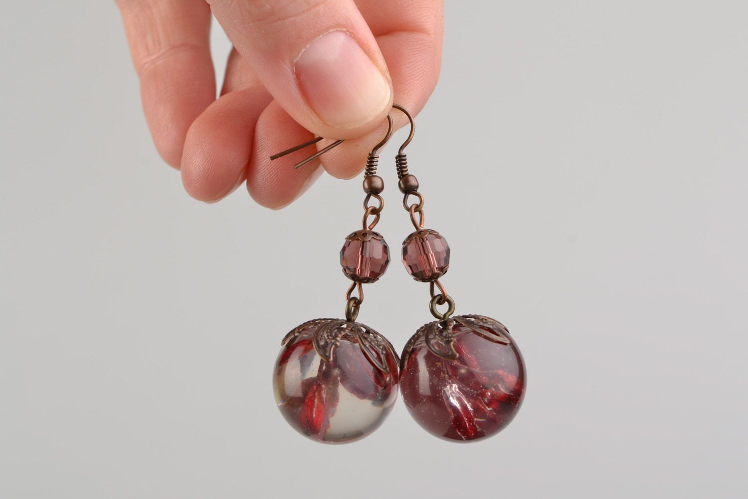 Homemade long ball earrings with barberry coated with epoxy resin photo 2