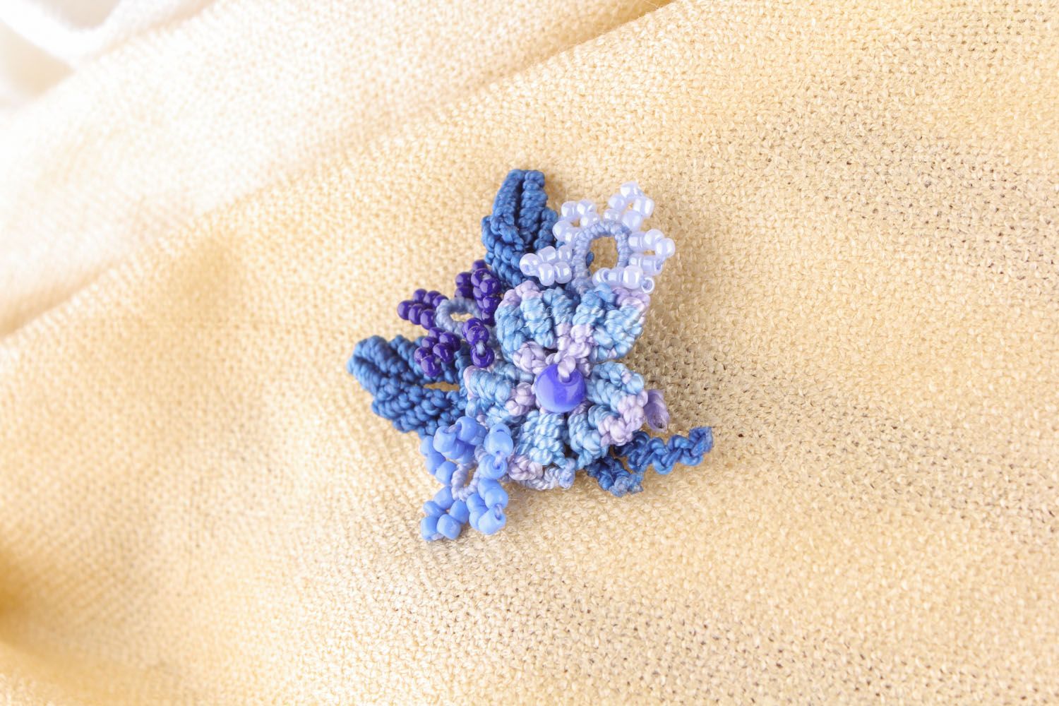 Broche tressée petite fleur mauve  photo 1