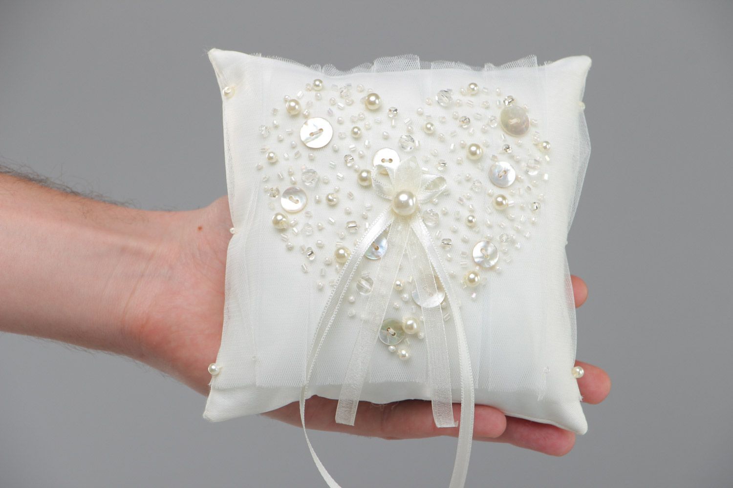Handmade elegant wedding ring pillow sewn of satin fabric of ivory color photo 5