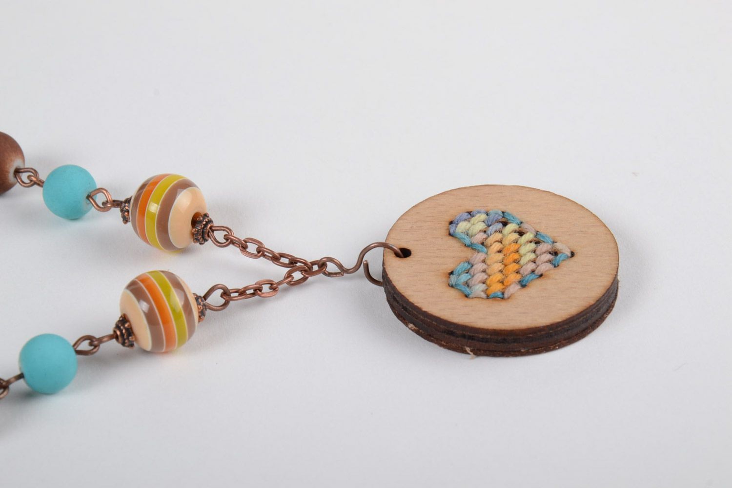 Handmade plywood pendant on a long chain with embroidery and beads for women photo 4