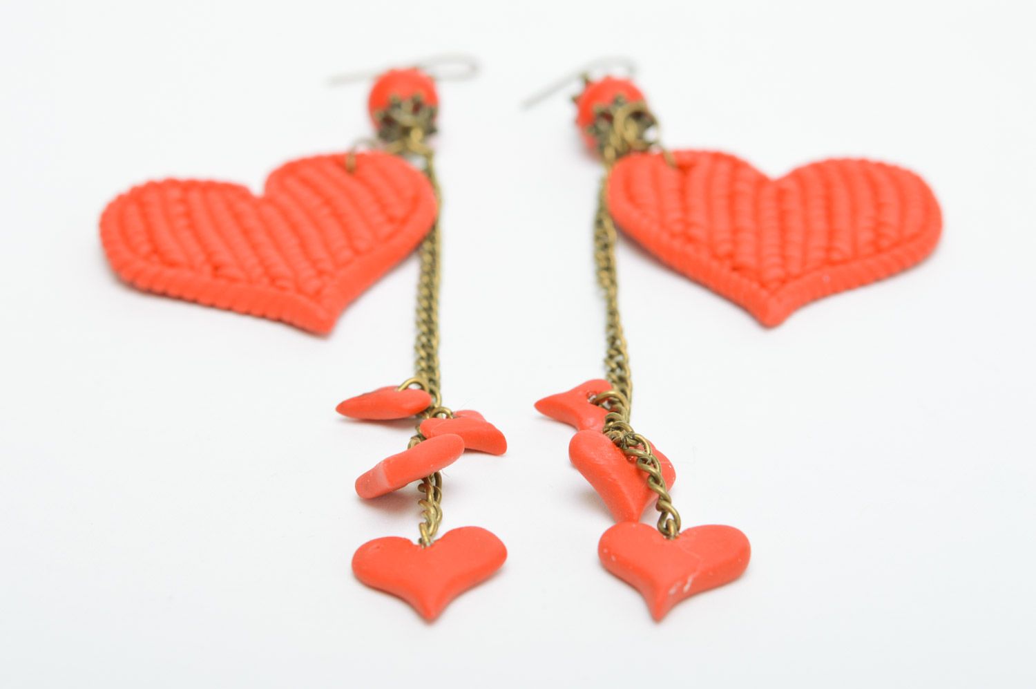 Long handmade earrings with red heart charms and with  knitted texture photo 5