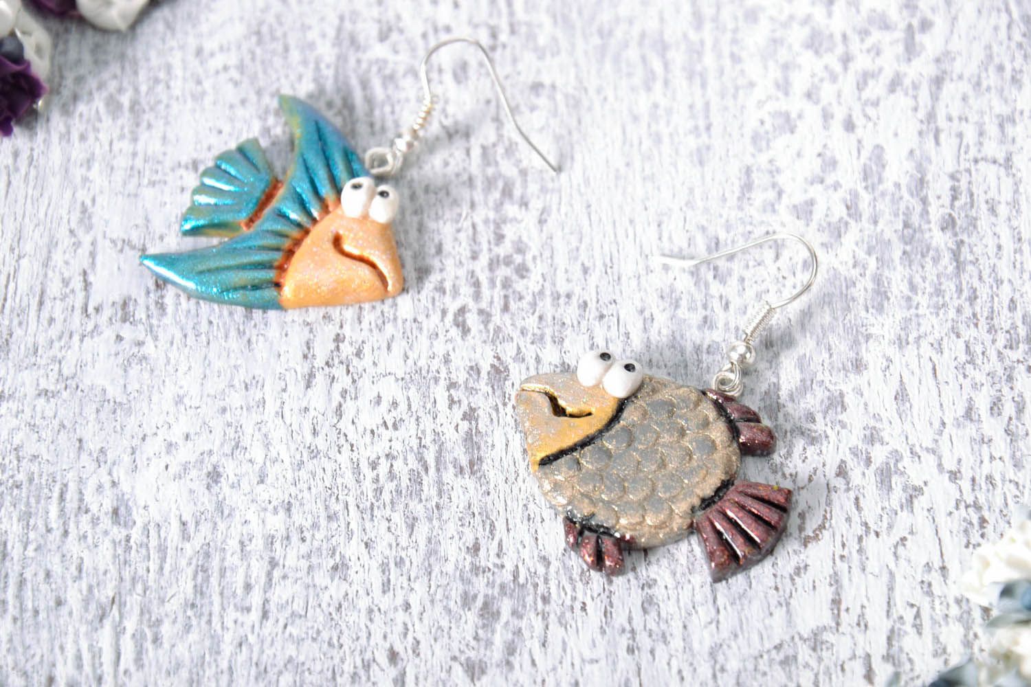 Earrings in the shape of fishes photo 1