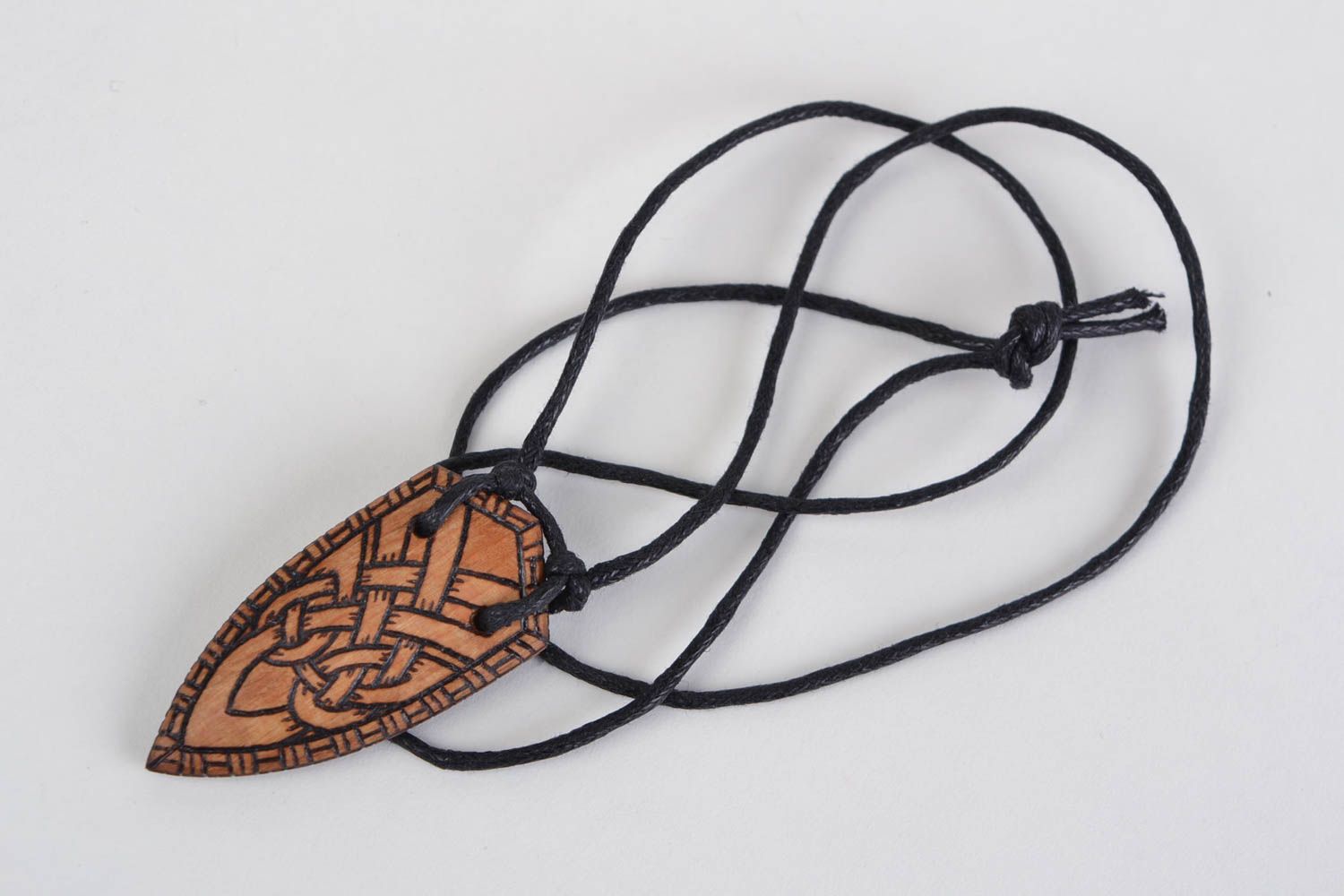 Handmade designer wooden pendant necklace with ornament in ethnic style on cord photo 1