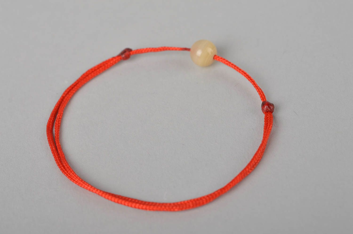 Handmade accessory beautiful wrist bracelet with beige bead designer bracelet    photo 5