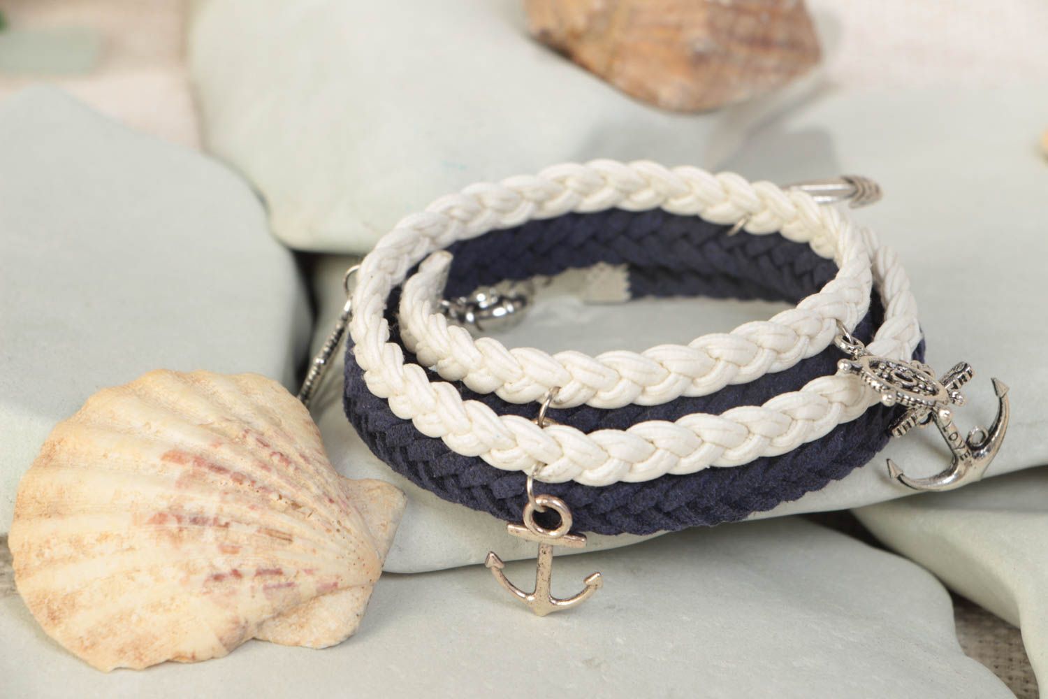 Handmade multi row wrist bracelet woven of suede cord in marine style with charm photo 1