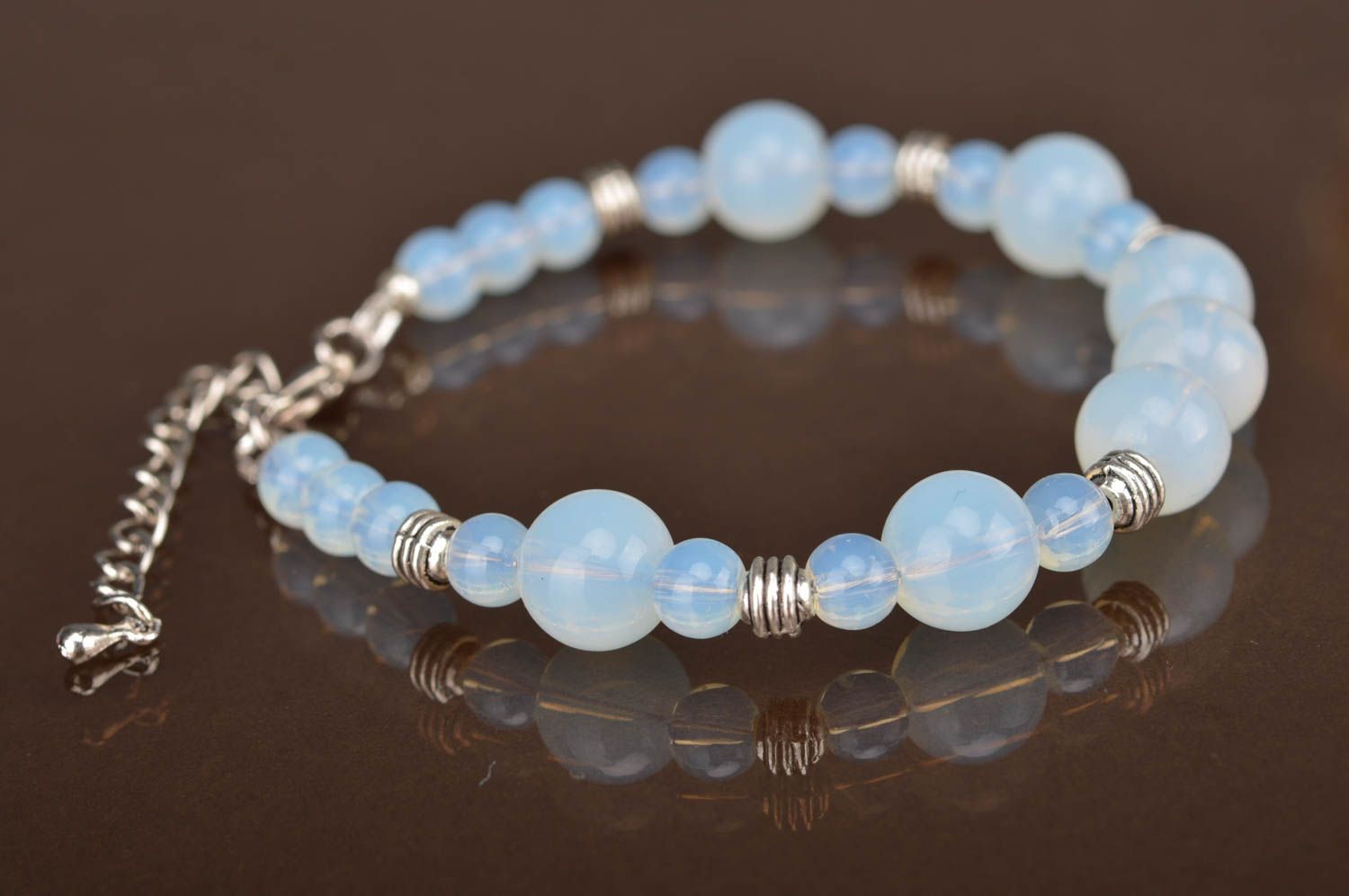 Beautiful women's handmade designer glass bead bracelet of gentle blue color photo 5