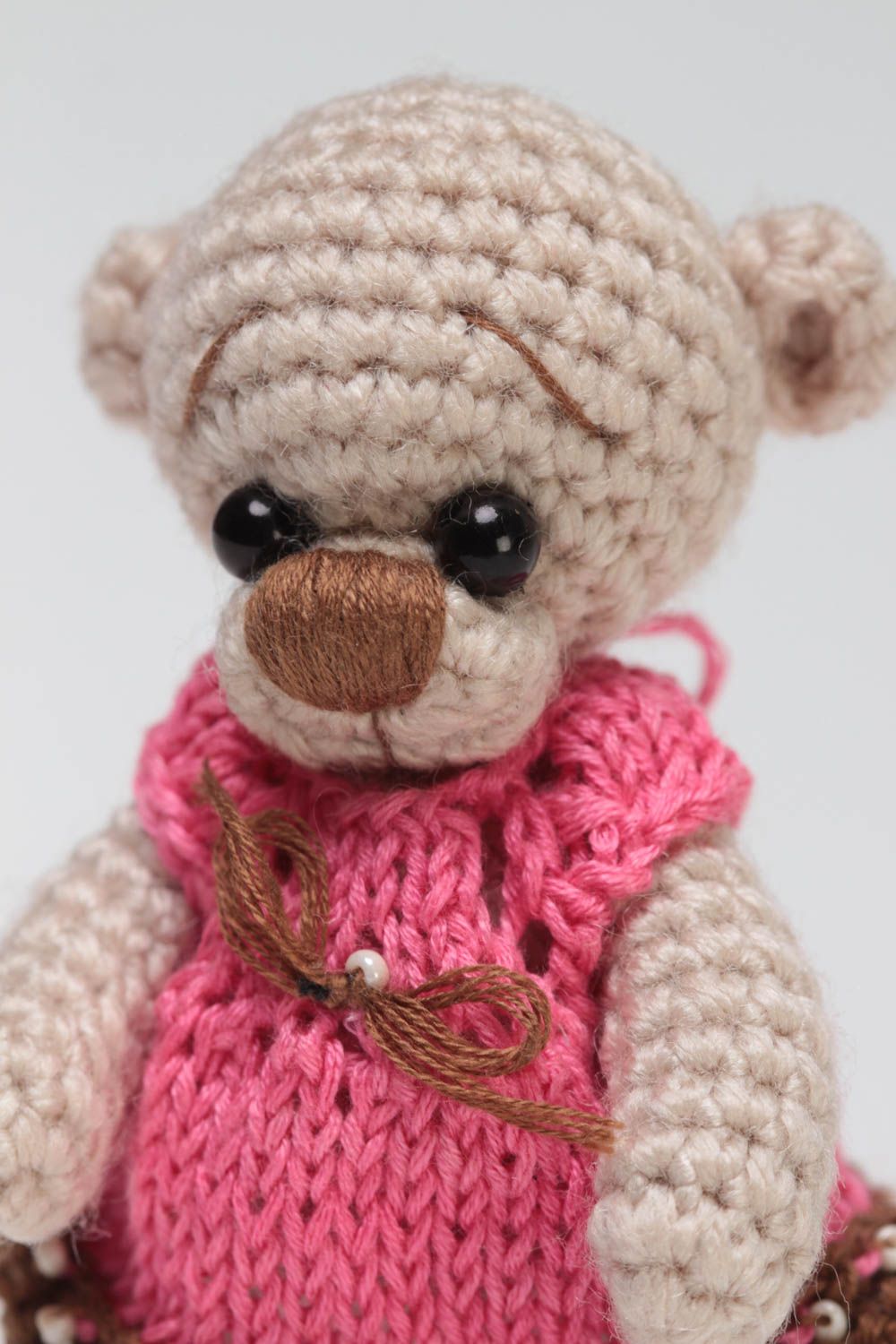 Handmade small soft crocheted toy beige bear girl in pink dress for children photo 3