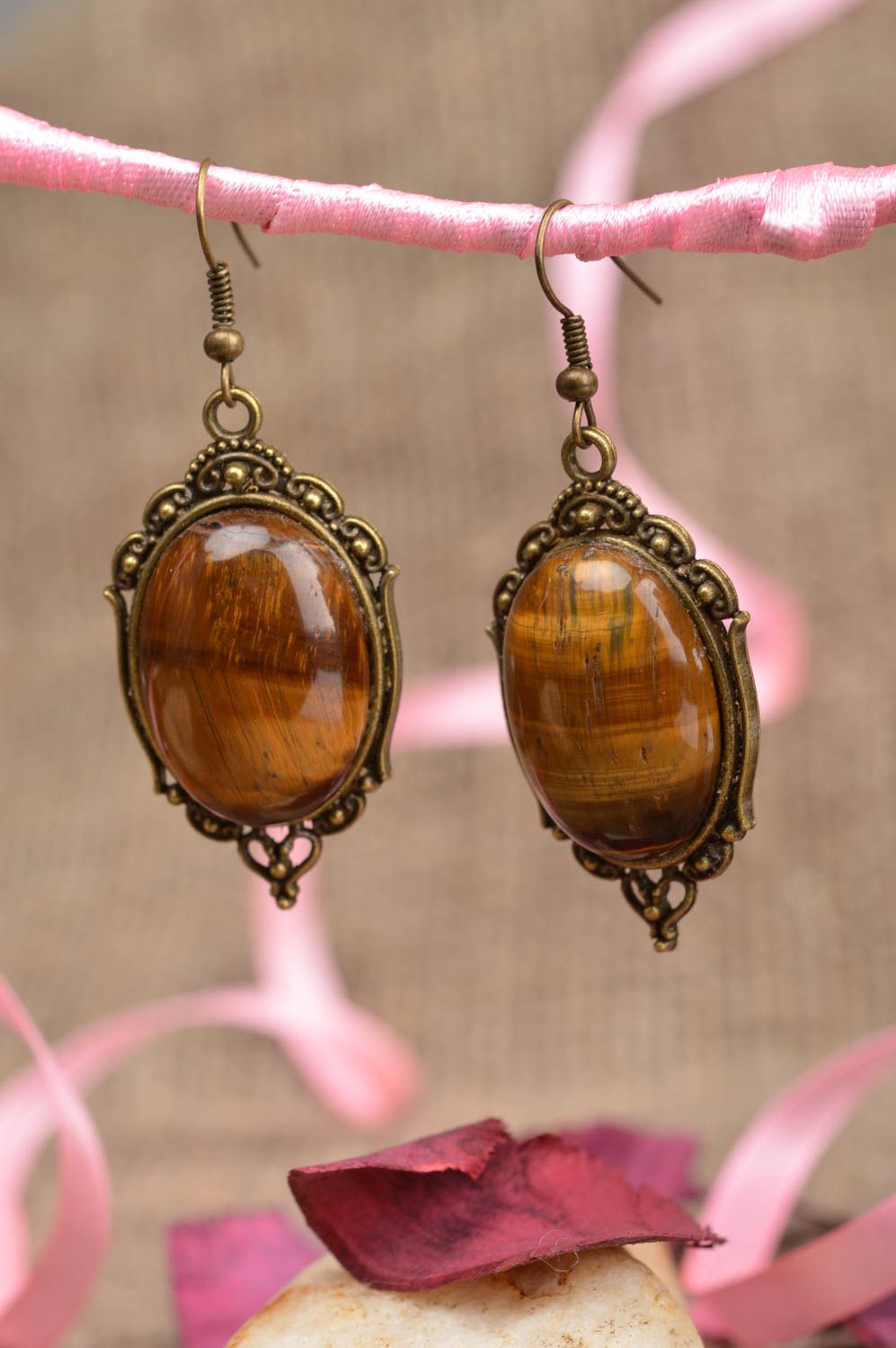 Handmade cute vintage metal earrings with cabochons made of brown stone photo 1