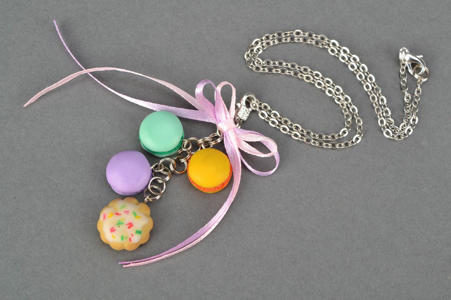 Polymer clay pendant with satin ribbons on metal chain photo 3