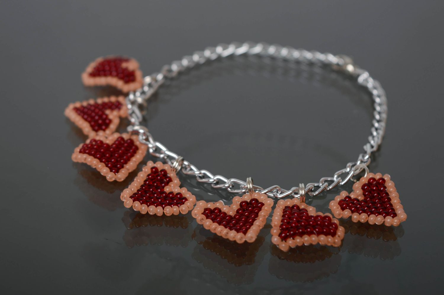 Beaded metal bracelet with charms Hearts photo 1
