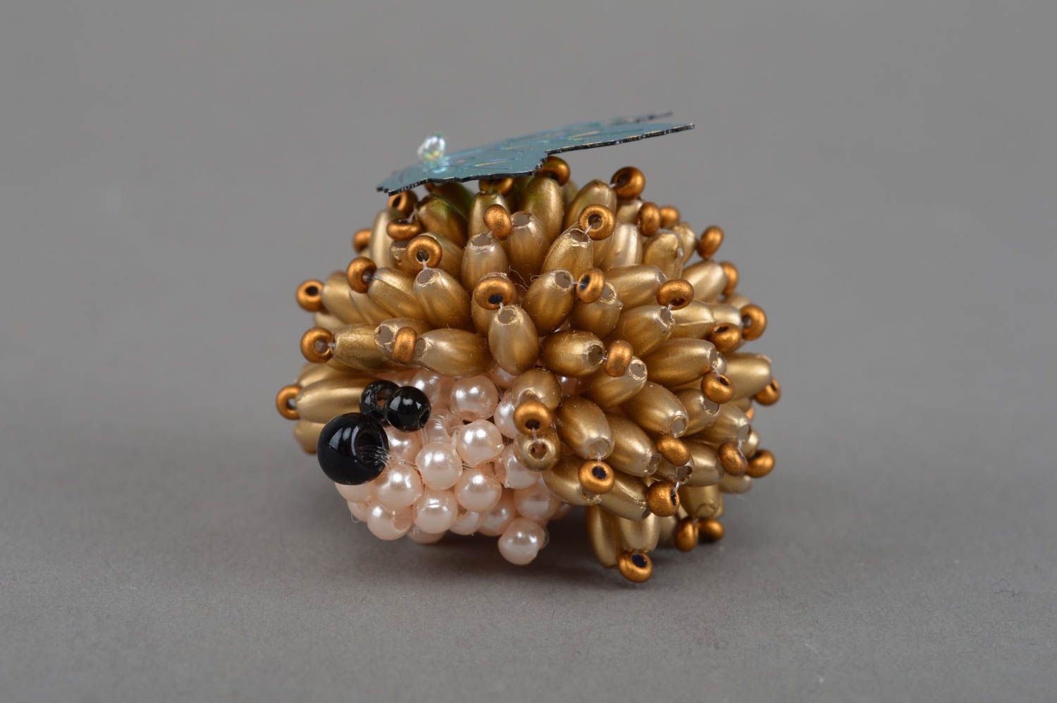 Small decorative designer handmade beaded animal figurine of golden hedgehog  photo 2