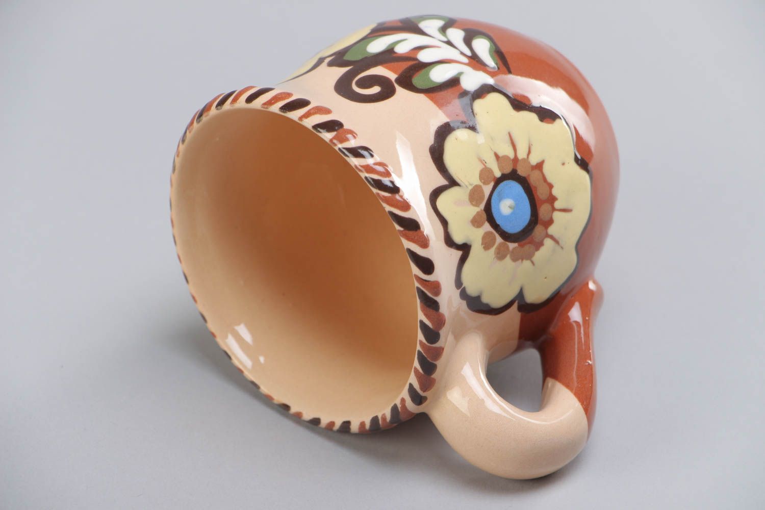 8 oz ceramic glazed clay drinking handmade cup with handle in brown and beige color with floral pattern photo 4
