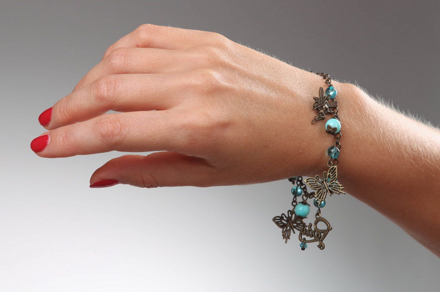Bronze Armband mit Türkis Schmetterlinge foto 4