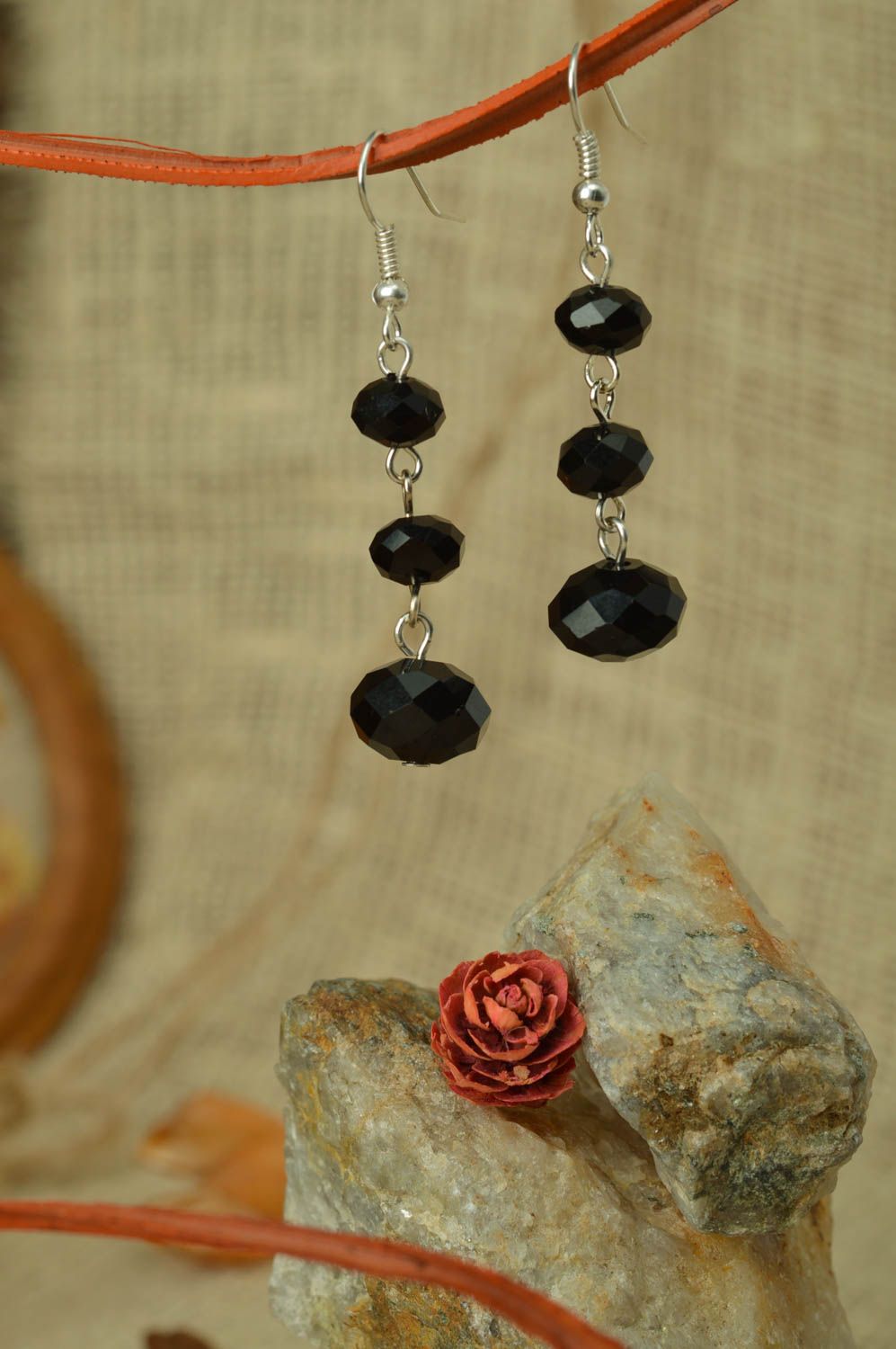 Long festive evening women's dangle earrings hand made of black faceted beads photo 1