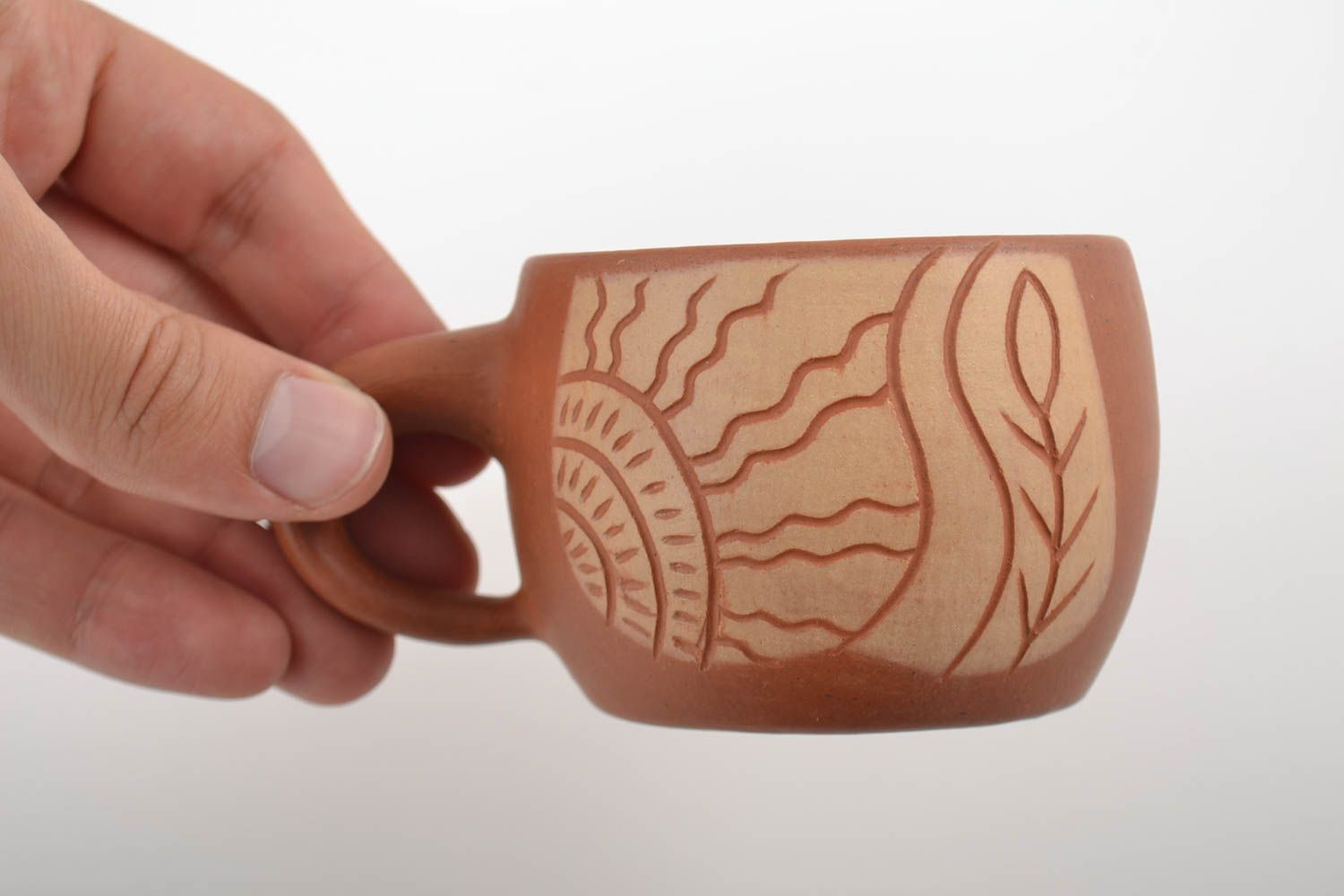 6 oz terracotta clay coffee cup with cave drawings and a handle photo 2