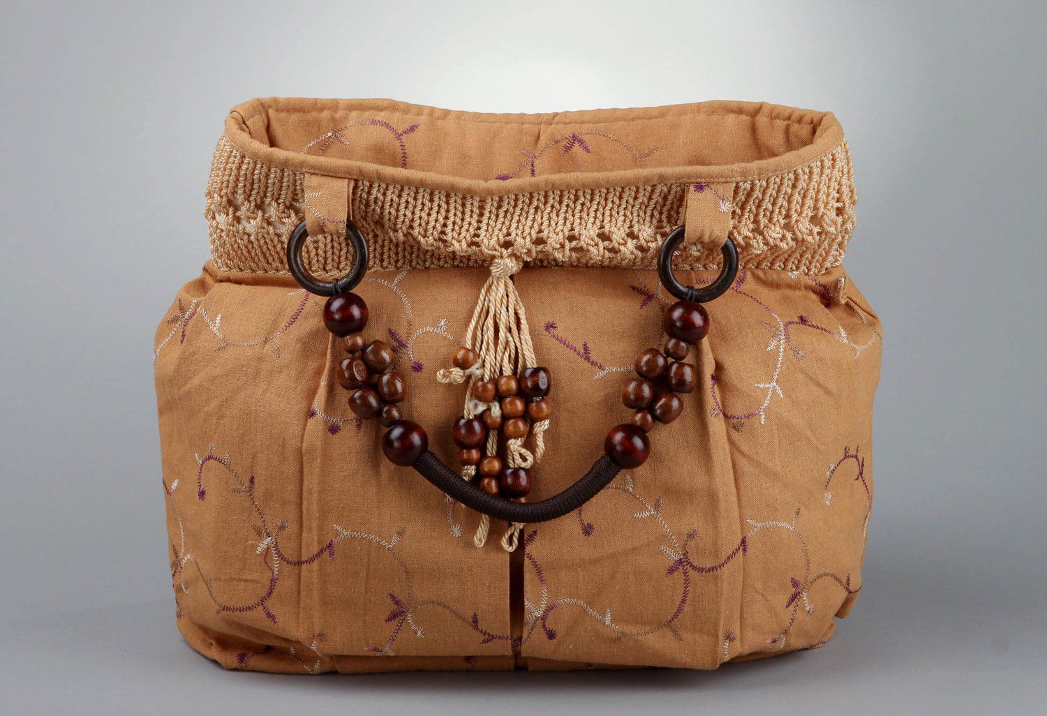 Textile brown bag with knitted top photo 1