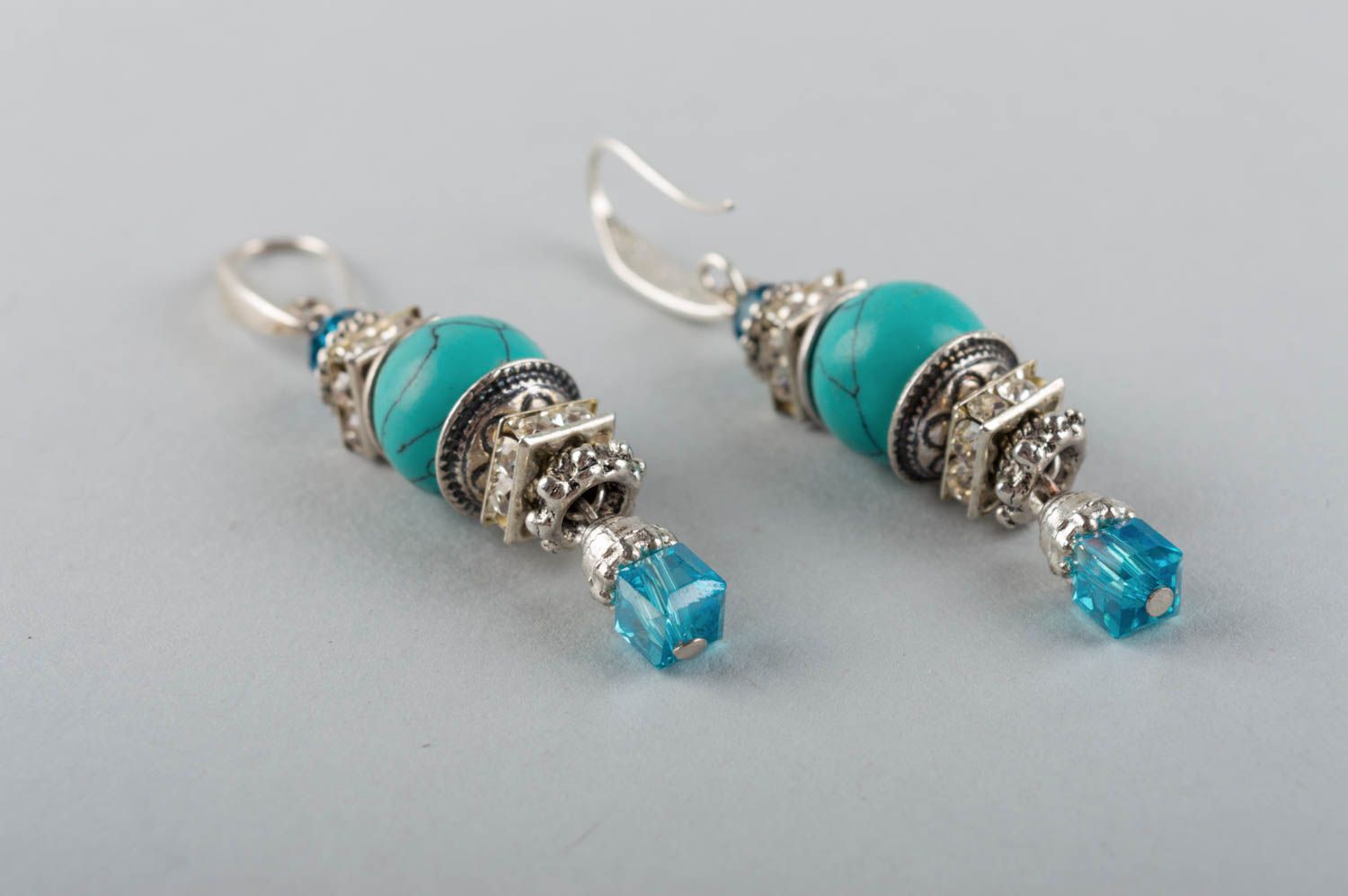 Elegant long handmade designer metal earrings with natural turquoise stone photo 3