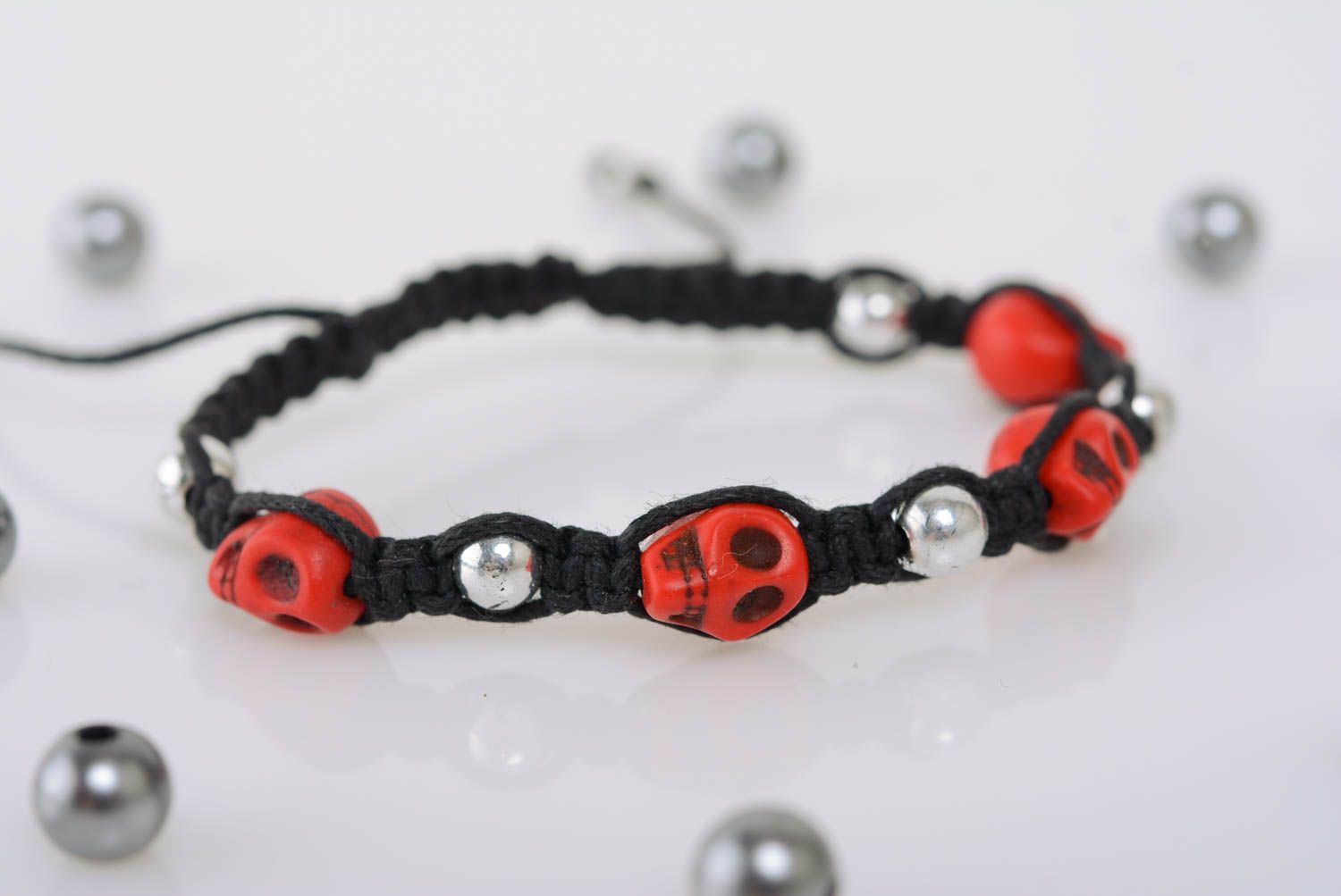 Handmade unusual women's woven cord bracelet with beads and skulls designer photo 1