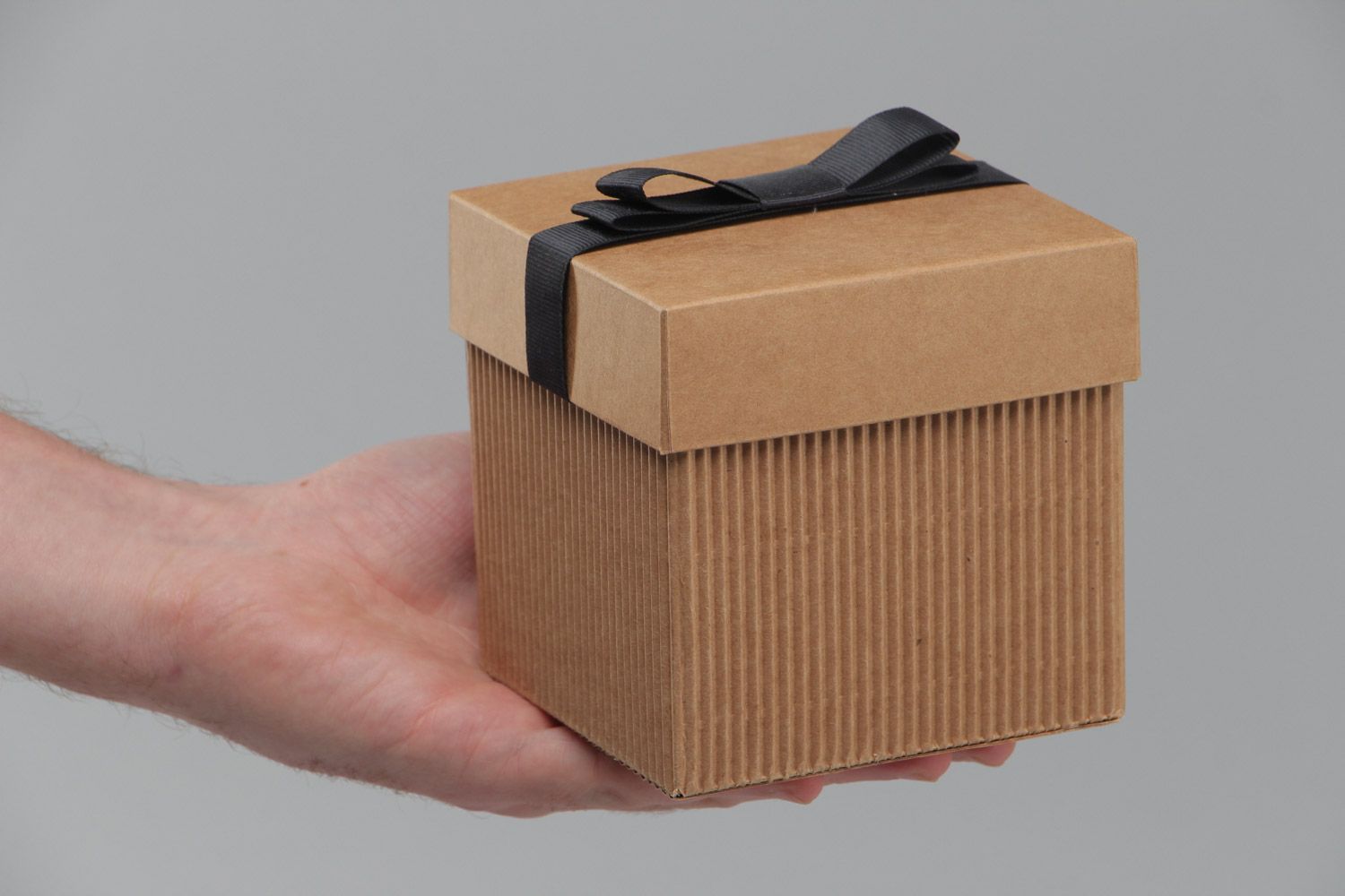 Handmade stylish corrugated carton gift box with black rep ribbon bow on lid photo 5