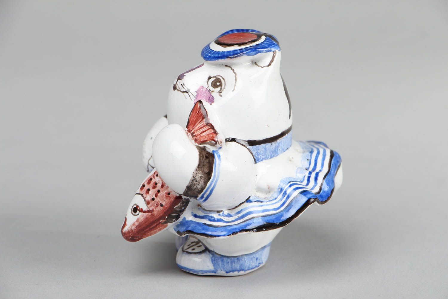 Estatueta de cerâmica em forma de um gato  foto 2